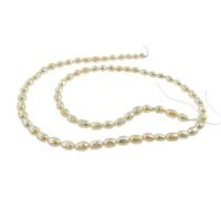 1 FILO PERLE ROSA CHIARO DA MOLLUSCO IN ACQUA DOLCE PICCOLE 5X3 MM.