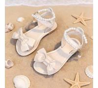1 Paio di sandali piatti estivi da ragazza con design a strappo, sandali romani eleganti con suola morbida di colore unito per bambini grandi, adatti per uscite quotidiane e vacanze al mare EUR34,EUR3
