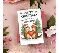 1 pezzo Adorabile biglietto di Natale con lontra - Coppia carina che tiene un cuore con il messaggio "Buon Natale alla metà di lontra migliore", biglietto di auguri festivo per coppie, perfetto per es