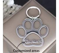 1 pezzo di un Portachiavi speciale in acciaio inossidabile a forma di zampa - Portachiavi con ciondolo inciso personalizzato a forma di zampa di cane con anello ad aggancio - Accessorio con simpatico