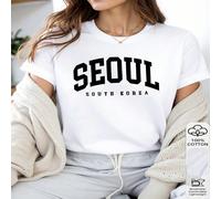 1 pezzo Maglietta da donna stile Seul Corea del Sud, 100% cotone, stampa con lettere varsity stile college, grafica della città, maglietta da viaggio moderna, adatta per tutte le stagioni, esclusiva, 