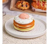 1 pezzo Torta di uova finta morbida e a lenta ripresa, con ripieno di crema gialla che sembra il tuorlo d'uovo, dolce giocattolo da spremere, campione per decorazione domestica (materiale) Dai un mors