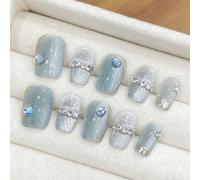 10 pezzi di unghie finte applicate a mano, perfettamente bilanciate tra toni freddi e una sensazione di lusso scintillante, un best seller versatile con un'atmosfera di alta gamma. L'effetto occhio di