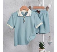 2 pezzi/set Completo casual per ragazzo giovane, composto da maglietta a polo con colletto a coste e pantaloni larghi, colletto a polo con bordi a contrasto per un effetto multistrato, lavorazione raf