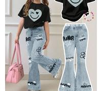 2 pezzi/set Maglietta a maniche corte con scollo rotondo e stampa di cuori e volti graffiti, e pantaloni a zampa, adatti per ragazze, casual e morbidi, ideali per l'estate, per casa, uscite, fotografi