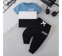 2 pezzi/set Maglietta a maniche corte con scollo tondo e stampa a blocchi di colore e lettera, e pantaloni con vita elastica, adatti per l'abbigliamento casual quotidiano dei bambini, outfit per bambi