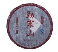 2009 Montagna Mengsong Tè Pu-Erh Crudo (Sheng) in Torta, 357g | Fragranza alta e persistente con un liquore dolce e setoso; delicato, stratificato, con salivazione rapida e duratura.