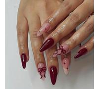 24 pezzi di unghie finte a mandorla di colore rosso vino con decorazioni a cometa e fiocco, effetto lucido, include 1 pezzo di gel trasparente e 1 lima per unghie. La scelta migliore per le donne per 