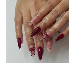 24 pezzi di unghie finte a mandorla di colore rosso vino con decorazioni a cometa e fiocco, effetto lucido, include 1 pezzo di gel trasparente e 1 lima per unghie. La scelta migliore per le donne per 