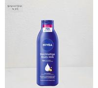 NIVEA Ricco latte per il corpo, crema nutriente intensa con acido ialuronico puro, olio di mandorle e siero per la cura profonda, lozione per la pelle secca (250 ml)