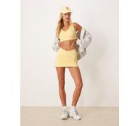 4505 - Gonna da tennis avvolgente in vita giallo pallido con pantaloncini integrati e tasca per cellulare M