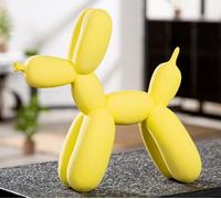 60757 Figura Palloncino Cane Jeune Resina Giallo Lunghezza 6,5cm Larghezza