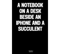 A notebook on a desk beside an iPhone and a succulent: The Notebook