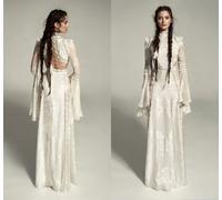 Abiti da sposa bohémien da spiaggia personalizzati con applicazioni in pizzo pieno a sirena a maniche lunghe per le vacanze estive Abito da uccello di campagna