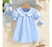 Abito a balze in stile A per bambine con maniche a palloncino e doppio colletto peter pan. Realizzato in tessuto di alta qualità, il design a-line, le maniche a palloncino e il doppio colletto peter p