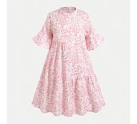 Abito camicia da ragazza pre-adolescente con stampa floreale giocosa, design con colletto e bottoni singoli, che combina la freschezza di una camicia e la morbidezza di un abito; polsini e orlo con vo
