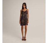 Abito mini con stampa leopardata, con sottili spalline a spaghetti, vestibilità aderente e un motivo audace e selvaggio. Perfetto per una serata fuori, conferisce un tocco giocoso e audace, ideale per