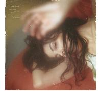 Ada Lea one hand on the steering wheel the other sewing a garden (Cassette)