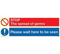 Adesivo vinilico fotoluminescente con scritta “Stop germs Please wait here to be seed”.
