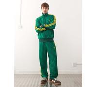 adidas Originals - Firebird - Pantaloni della tuta ampi verde college con monogramma M