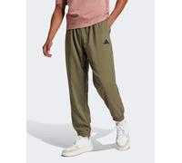 ADIDAS SPORTSWEAR Pantaloni sportivi 'Essentials' oliva / nero Uomo ADIDAS SPORTSWEAR Mxregular oliva / nero