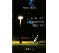 Alla luce dei lampioni nella via