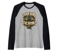 Allenati Duro resta umile | Muay Thai Gesù Maglia con Maniche Raglan