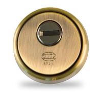 Amig - Cylinder protector Mod. 31 - Ottone - Effetto cuoio - Anello esterno cavo - Ø65 mm - Con piastra antitrapano - Con viti e supporto - Cilindro Europrofilo EN1303 - Corpo in acciaio sinterizzato