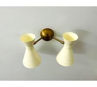 Applique doppia in ottone grezzo artigianale Radiant Elegance per illuminare ...