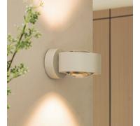 Arcchio applique a LED Rotari, lente, su/giù, bianco, metallo Arcchio