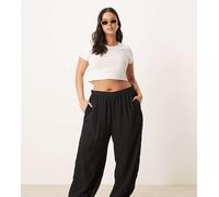 ASOS DESIGN Curve - Billow - Pantaloni con polsino neri testurizzati a righe-Nero L