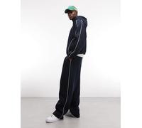ASOS DESIGN - Joggers super ampi blu navy con profili laterali in coordinato L