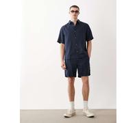 ASOS DESIGN - Pantaloncini lunghezza media slim in 100% lino color blu navy in coordinato S