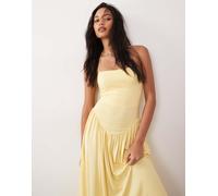 ASOS DESIGN - Prendisole giallo allacciato al collo con vita scesa 40