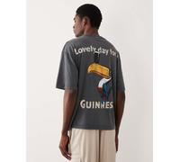 ASOS DESIGN - T-shirt oversize nero slavato con stampa Guinness XS