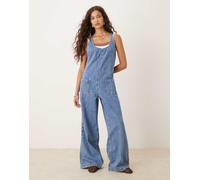 ASOS DESIGN - Tuta jumpsuit in denim lavaggio blu medio con incrocio sulla schiena 50