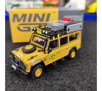 AUTO MINI GT LAND ROVER DEFENDER 110 1989 CAMEL TROPHY AMAZON 1:64 NUOVO