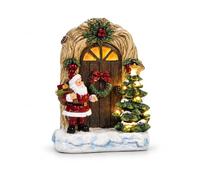 Avilia Babbo Natale Luminoso a Batteria con Porta e Alberello, 19 cm | Statuina natalizia luminosa con sacco dei doni, porta con ghirlanda, finestrella e albero illuminati, base innevata