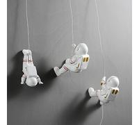 AWNR 3 statuette astronauta rampicanti da appendere alla parete, decorazione moderna per la casa, decorazione a tema spazio esterno sculture da parete decorazione da parete sfondo decorazione da