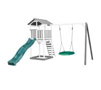 AXI Beach Tower parco giochi in legno in grigio e bianco | Torre di gioco per bambini con sabbiera, altalena a nido e scivolo verde | Casa per bambini su palafitte per il giardino