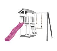 AXI Beach Tower parco giochi in legno in grigio e bianco | Torre di gioco per bambini con sabbiera, altalena e scivolo viola | Casa per bambini su palafitte per il giardino