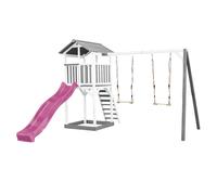 AXI Beach Tower parco giochi in legno in grigio e bianco | Torre di gioco per bambini con sabbiera, doppia altalena e scivolo viola | Casa per bambini su palafitte per il giardino