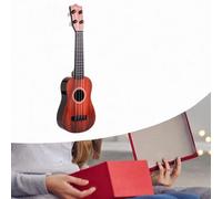 Bambini ukulele prescolare che impara la piccola chitarra per principianti