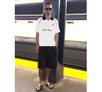 Bershka - Polo rétrosport bianca con profili a contrasto-Bianco M