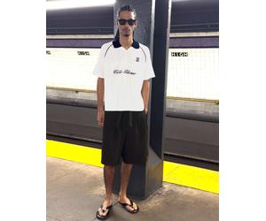 Bershka - Polo rétrosport bianca con profili a contrasto-Bianco S