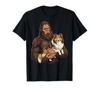 Bigfoot Che Tiene in Braccio Il Cane Pastore delle Shetland Maglietta