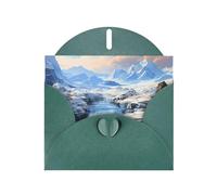 Biglietto di auguri orizzontale con paesaggio montano innevato con busta verde scuro a forma di cuore e scrivere vari saluti di festa