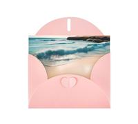 Biglietto di auguri orizzontale con paesaggio sulla spiaggia con busta a forma di cuore rosa e scrivere vari auguri di festa