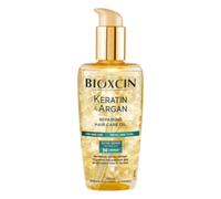 Bioxcin Keratin & Argan - Olio riparante per capelli 150 ml, cura efficace in profondità per capelli danneggiati, con effetto anti-crespe, per tutti i tipi di capelli
