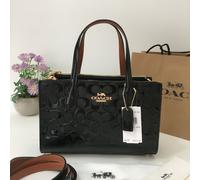 Borsa COACH Nina Small Tote Bag 25 Signature in pelle verniciata nera CV400 O...
